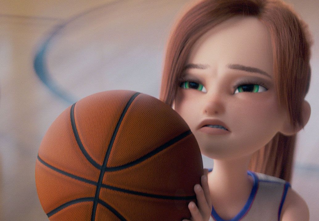 girl with basketball squinting